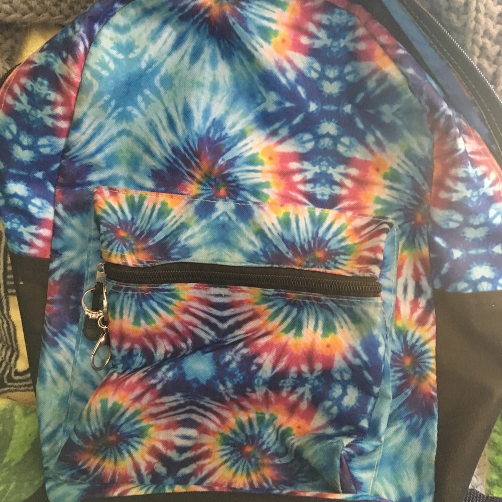 Various tie dyes not all pictured pink clothes